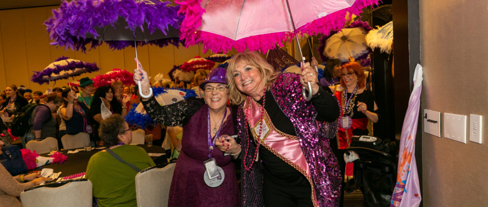 BLC founder Jo Carol Jones and author Tina DeSalvo march with Tina's Second Line Band